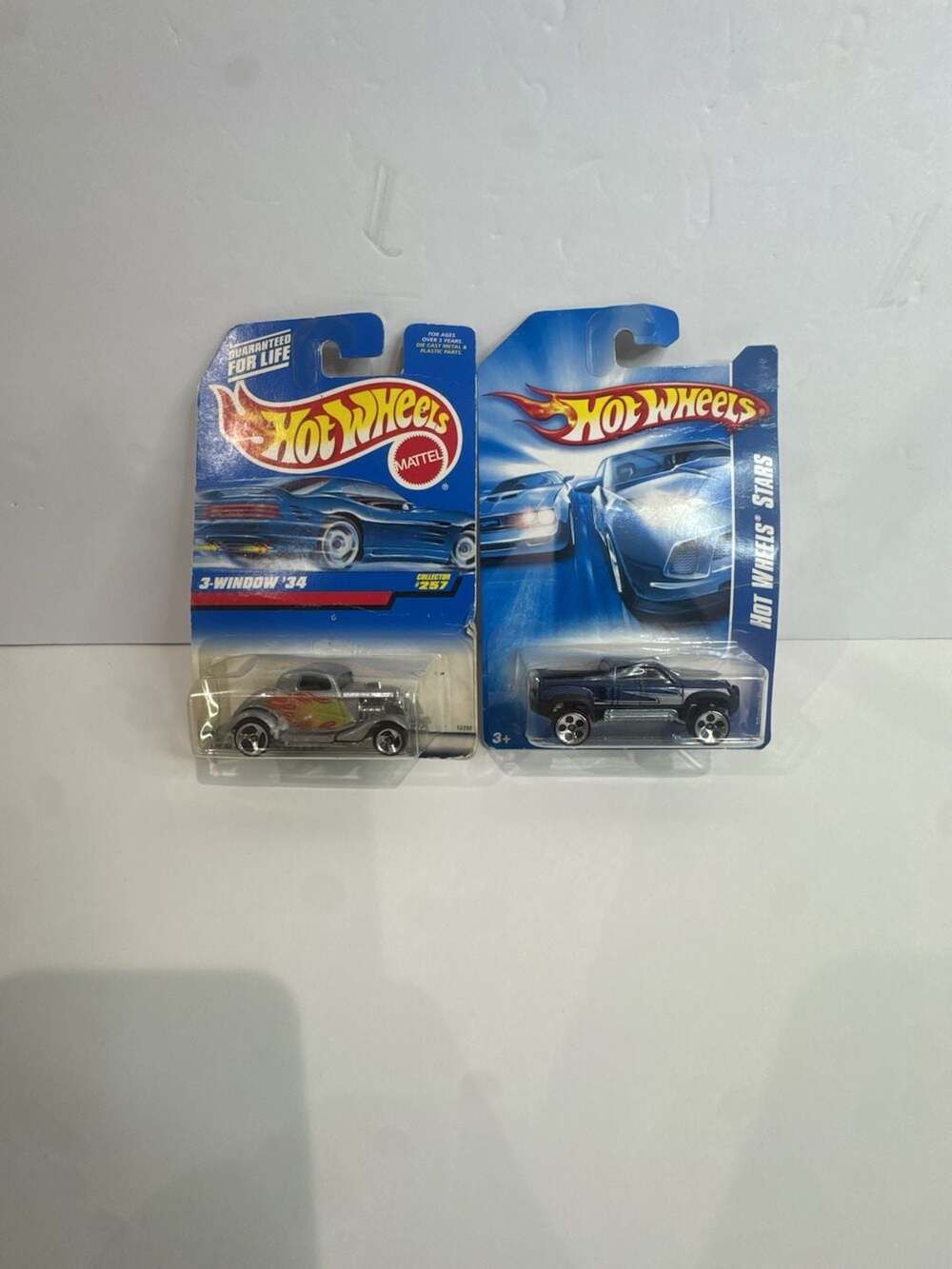 Hot Wheels 1998 3-Window '34 #257 and Hot Wheels Stars Mega-Duty 2-Car Bundle
